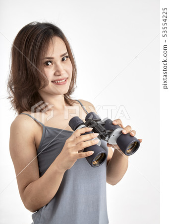 Young Asian woman with binoculars 53554225