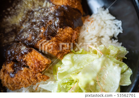 Crispy fried pork cutlet with curry rice Crispy fried pork cutlet with curry rice 53562701