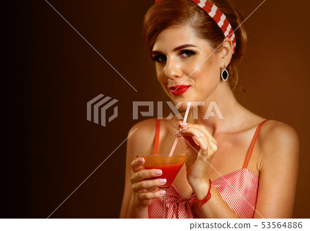 Girl drinks martini cocktail. Woman on thematic party retro style Girl drinks martini cocktail. Woman on thematic party retro style 53564886