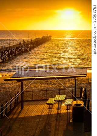 Picnic area near Port Noarlunga jetty at sunset Picnic area near Port Noarlunga jetty at sunset 53568762