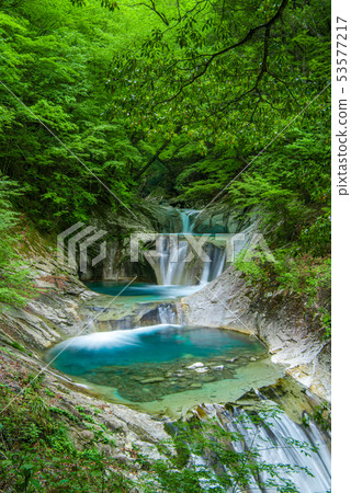 Fresh green nishizawa valley seven waterfalls five steps waterfall 53577217