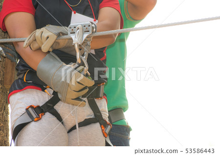 Little brave caucasian child at outdoor treetop Little brave caucasian child at outdoor treetop 53586443