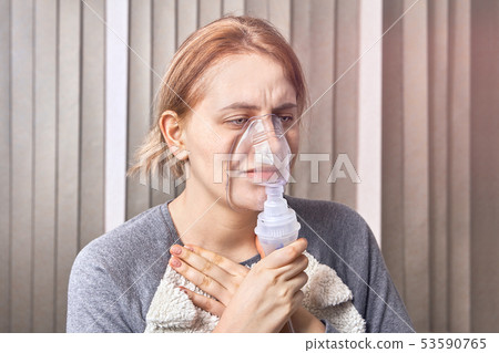 Nebulizer chamber helps with asthma attack. 53590765