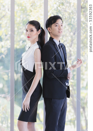 Asian business people posing in office.. 53592363