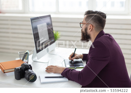 people, design and style concept - graphic designer sketching new project on tablet working on 53594222