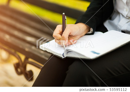 Happy businesswoman calling on mobile phone and Happy businesswoman calling on mobile phone and 53595112