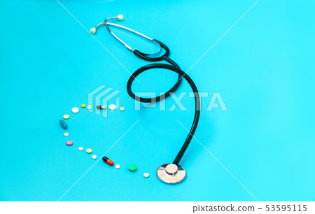 Medicine stethoscope and pills Medicine stethoscope and pills 53595115