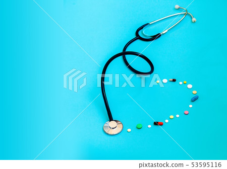 Medicine stethoscope and capsules and pills Medicine stethoscope and capsules and pills 53595116
