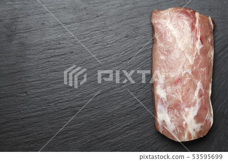 raw pork on black background raw pork on black background 53595699