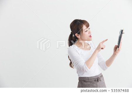 Woman in white apron · White back 53597488