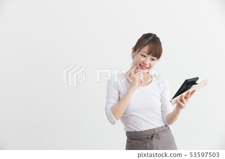 Woman in white apron · White back Woman in white apron · White back 53597503