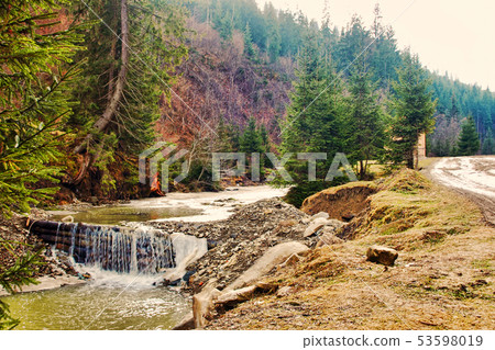 Spring Mountains river with river dam and stones. Spring Mountains river with river dam and stones. 53598019