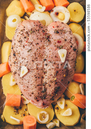 Seasoned chicken breast with carrot and potato Seasoned chicken breast with carrot and potato 53598586