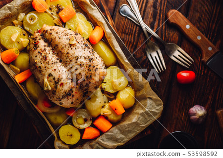 Seasoned chicken breast baked in oven Seasoned chicken breast baked in oven 53598592