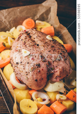Seasoned chicken breast with carrot and potato Seasoned chicken breast with carrot and potato 53598595
