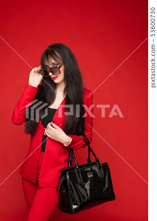 Portrait of young beautiful woman thoughtfully 53600730