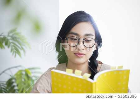 Young lady · reading Young lady · reading 53602386