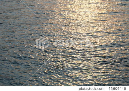 sunset reflect from the sea. 53604446