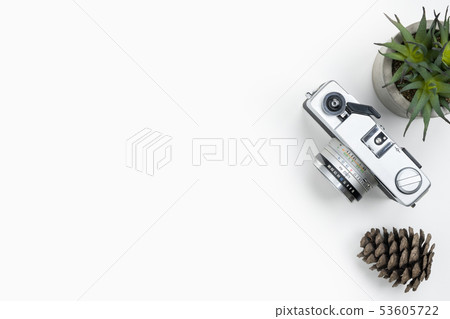 White photographer desk table with film camera 53605722