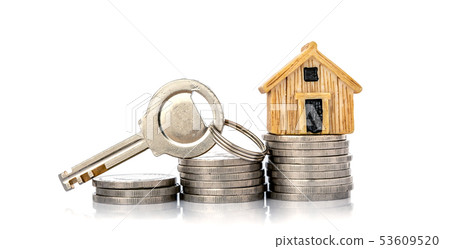 Close up house model place on stacking of money Close up house model place on stacking of money 53609520