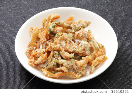 Deep-fried chicken skin. Deep-fried chicken skin. 53610261