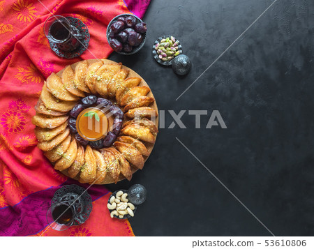 Arabic sweets. Arabian Qatayef. Ramadan background 53610806