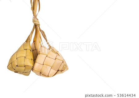 Bunch of ketupat hanging from its weaved palm 53614434