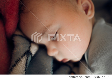 Close Up of a Baby Sleeping Close Up of a Baby Sleeping 53615498