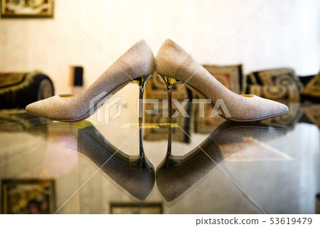 Women's shoes on the mirror surface Women's shoes on the mirror surface 53619479