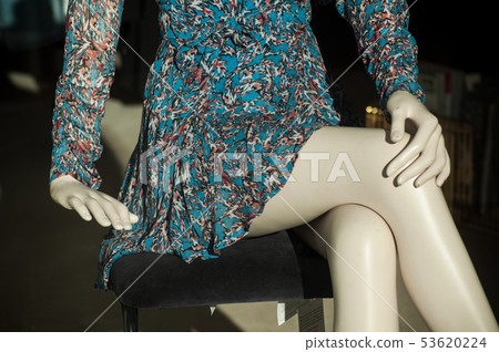closeup of blue summer dress on mannequin legs closeup of blue summer dress on mannequin legs 53620224