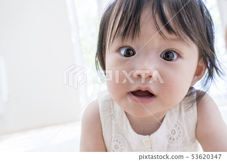 Baby staring still Baby staring still 53620347