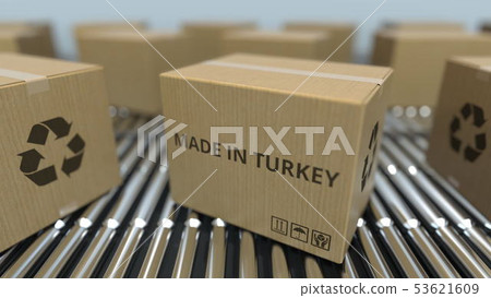 Cartons with MADE IN TURKEY text on roller conveyor. Turkish goods related 3D rendering 53621609