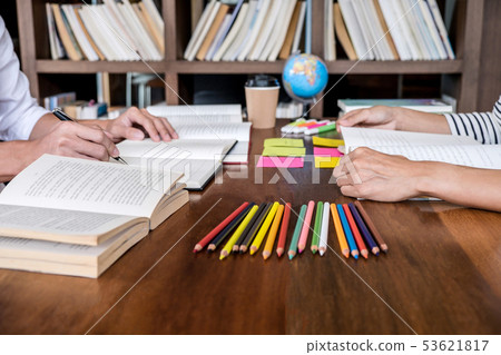 High school or college student group sitting at 53621817