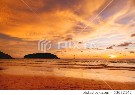 Gorgeous orange sunset at Nai Harn beach. Phuket Gorgeous orange sunset at Nai Harn beach. Phuket 53622142