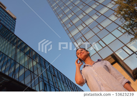 business, communication, technology and people concept - young smiling african american business, communication, technology and people concept - young smiling african american 53623239