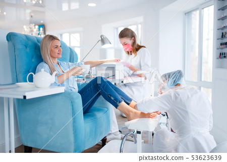 Cosmetology salon, manicure and pedicure procedure Cosmetology salon, manicure and pedicure procedure 53623639