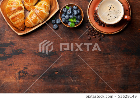 Coffee and croissants breakfast Coffee and croissants breakfast 53629149