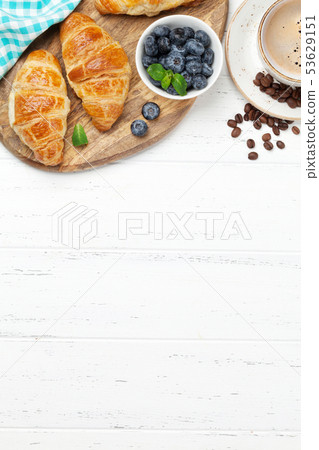Coffee and croissants breakfast Coffee and croissants breakfast 53629151