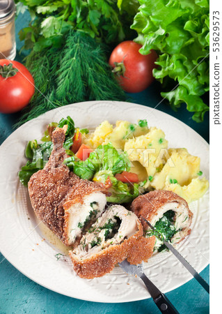 Chicken Kiev, breaded chicken breast Chicken Kiev, breaded chicken breast 53629573