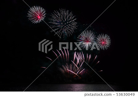 Colorful fireworks of various colors at night Colorful fireworks of various colors at night 53630049