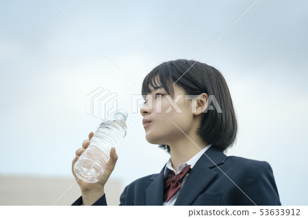 High school student rooftop hydration High school student rooftop hydration 53633912