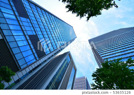 Building and trees and blue sky Urban and blue sky Building and trees and blue sky Urban and blue sky 53635126