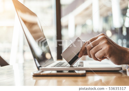 Online banking businessman using Laptop with Online banking businessman using Laptop with 53635317