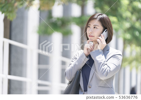 20's business woman smartphone 20's business woman smartphone 53636776