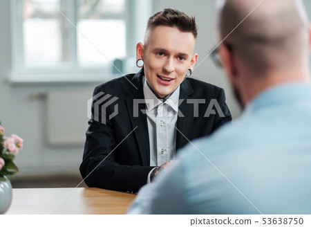 Alternative man attending job interview Alternative man attending job interview 53638750