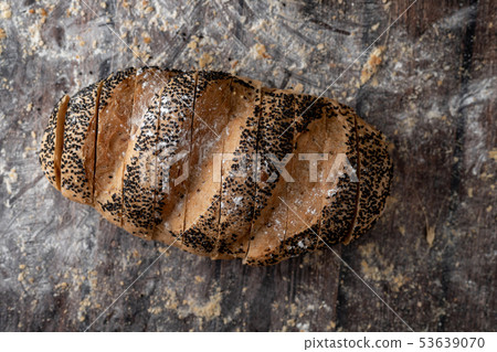 Gold corn bread loaf on the wooden table 53639070