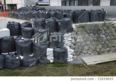 Temporary closure with large soil bags 53639693