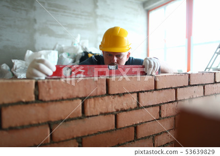 Stacker man in hardhat Stacker man in hardhat 53639829