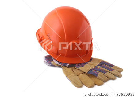 Orange hard hat, safety gloves on white background. Safety helmet. Orange hard hat, safety gloves on white background. Safety helmet. 53639955