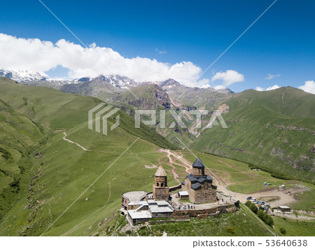 Aerial view to Gergeti Trinity Church or Tsminda Aerial view to Gergeti Trinity Church or Tsminda 53640638